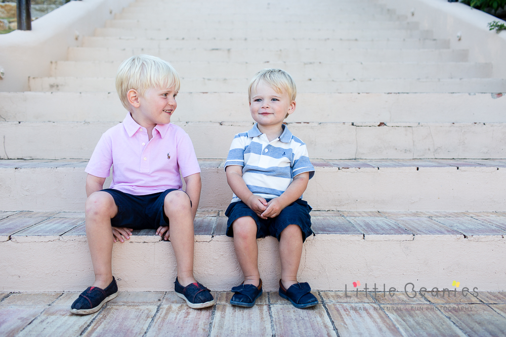 Lisa Jordan's boy's from Little Beanies photography on the steps laughing and joking together