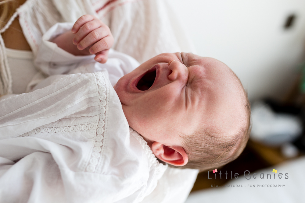 baby yawning on newborn photography shoot Kenilworth