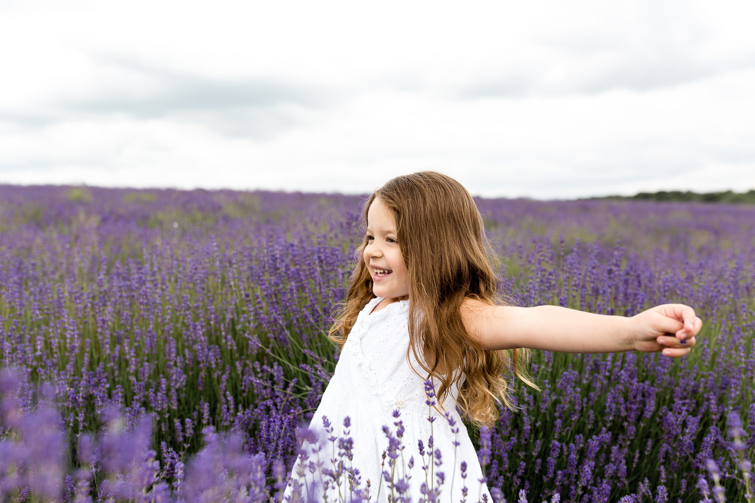 inspiration picture of a little girl having fun in a lavender field