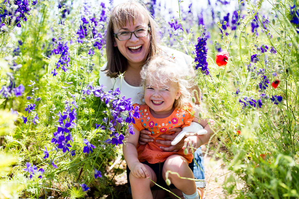 mum and daughter in confetti fields for photo shoot