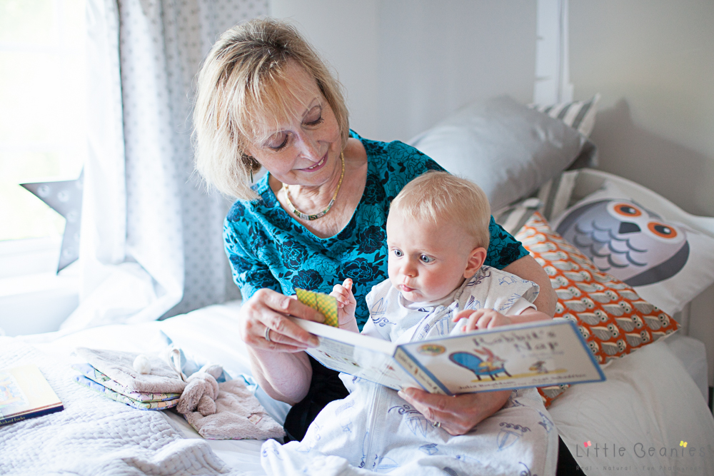 Louis reading book with nana c