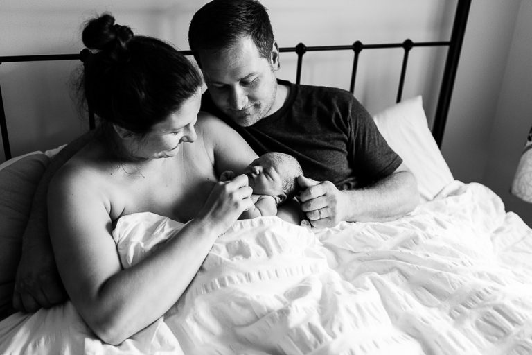 Parents and baby after birth of baby girl